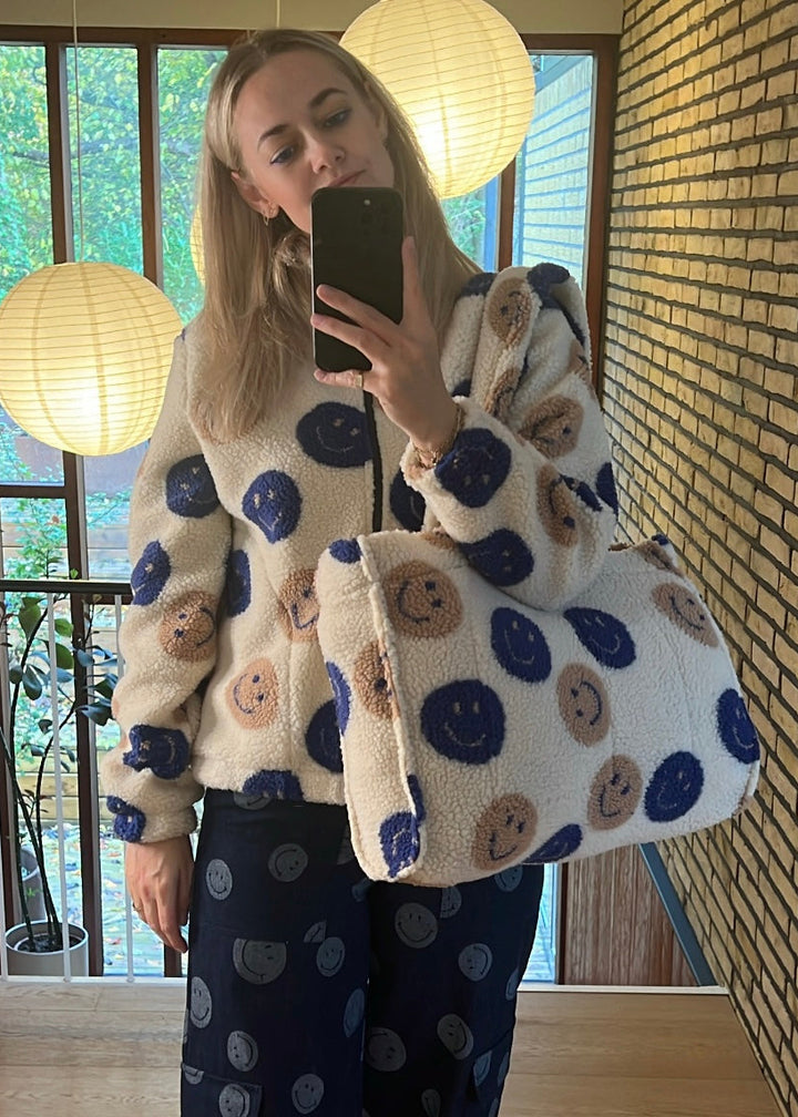 Teddy Shopper, Smiley