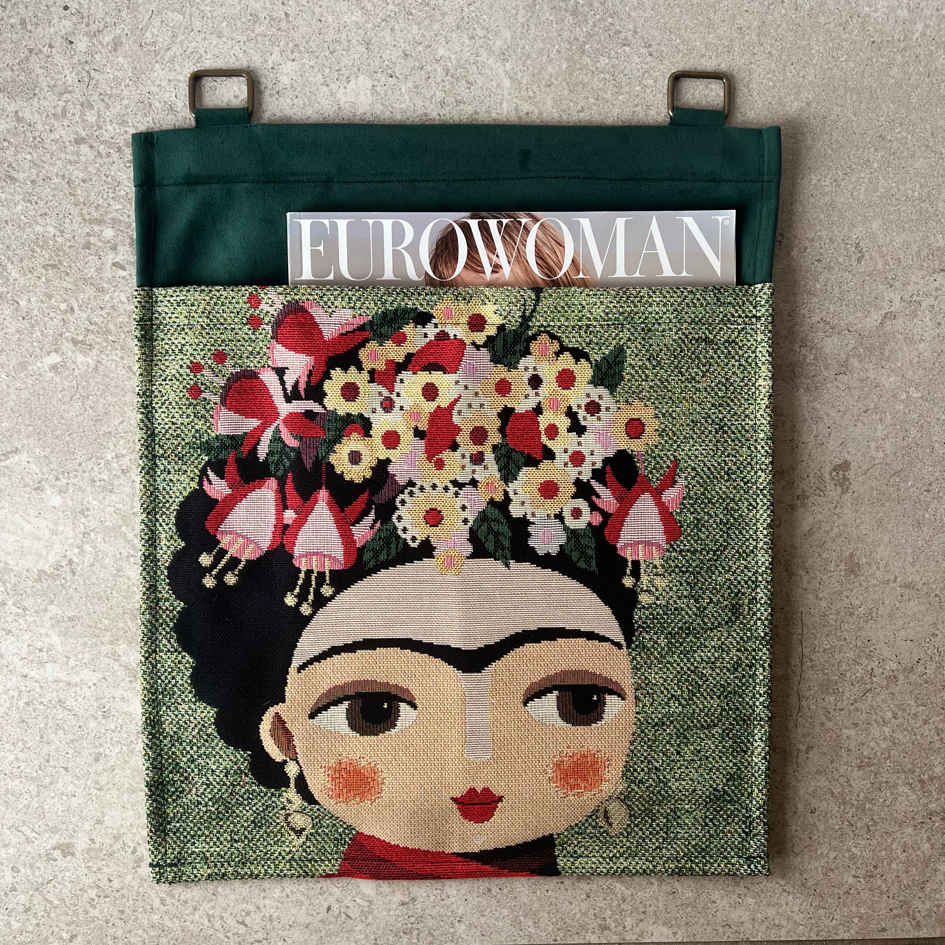 Frida, Magasinholder